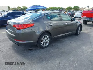 2011 Kia Optima EX with VIN KNAGN4A74B5164311, listed as a IAAI auction lot 41558907 with Not Provided miles and . Bid and sale history available at carsss.com. Image 4.