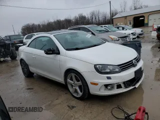 2013 Volkswagen Eos Komfort with VIN WVWBW8AH5DV001888, listed as a Copart auction lot 86886554 with 188,812 mi miles and Salvage Title. Bid and sale history available at DreamBid. Image 4.