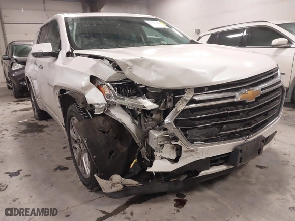 2018 Chevrolet Traverse Premier with VIN 1GNEVJKW2JJ103924, listed as a IAAI auction lot 41576128 with 128,694 mi miles. Bid and sale history available at carsss.com. Image 6.