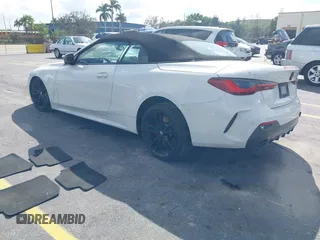 2023 BMW 4 Series 430i with VIN WBA23AT06PCL13531, listed as a IAAI auction lot 41528176 with 26,961 mi miles. Bid and sale history available at carsss.com. Image 3.