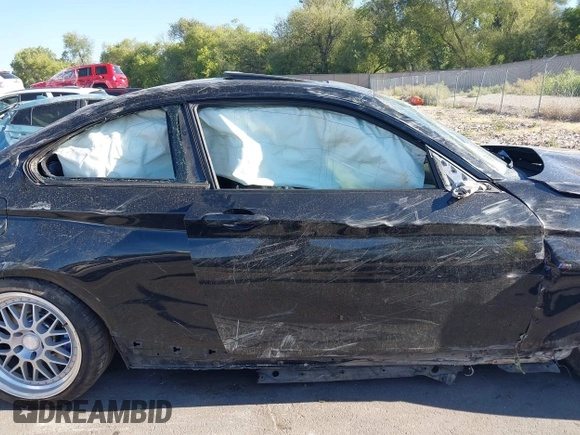 2014 BMW 2 Series M235i with VIN WBA1J7C50EVX33903, listed as a IAAI auction lot 40207684 with 81,766 mi miles and . Bid and sale history available at DreamBid. Image 12.