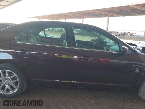 2011 Ford Fusion SEL with VIN 3FAHP0JG7BR324789, listed as a IAAI auction lot 42039962 with 164,726 mi miles. Bid and sale history available at carsss.com. Image 13.