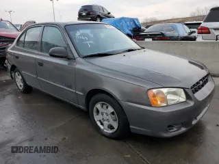 2002 Hyundai Accent GL with VIN KMHCG45C72U269610, listed as a Copart auction lot 80362953 with 89,481 mi miles and Salvage Title. Bid and sale history available at carsss.com. Image 4.