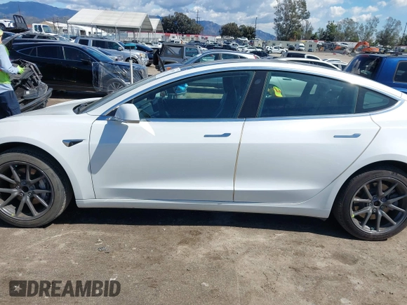 2020 Tesla Model 3 Standard Range Plus with VIN 5YJ3E1EA4LF644967, listed as a IAAI auction lot 41745984 with 23,479 mi miles and . Bid and sale history available at DreamBid. Image 15.