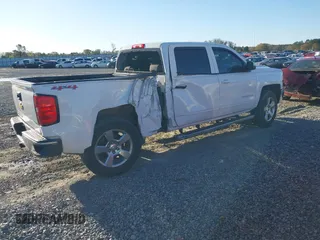2017 Chevrolet Silverado 1500 LT with VIN 3GCUKREC8HG490827, listed as a IAAI auction lot 41810412 with 121,572 mi miles and . Bid and sale history available at DreamBid. Image 4.