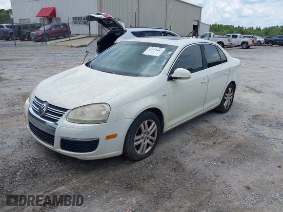 2007 Volkswagen Jetta Wolfsburg Edition z VIN 3VWEF71K47M192184, wystawiony jako IAAI lot #42573483 z przebiegiem 207 809 mil mil oraz . Historia ofert i sprzedaży dostępna na DreamBid. Obrazek 2.