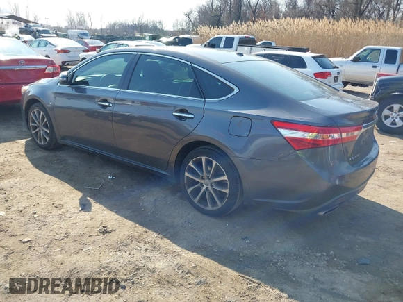 2015 Toyota Avalon Limited with VIN 4T1BK1EB4FU187338, listed as a IAAI auction lot 41696526 with 101,258 mi miles and . Bid and sale history available at DreamBid. Image 3.