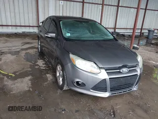 2013 Ford Focus SE with VIN 1FADP3F29DL243937, listed as a IAAI auction lot 42145911 with 90,376 mi miles and . Bid and sale history available at DreamBid. Image 1.