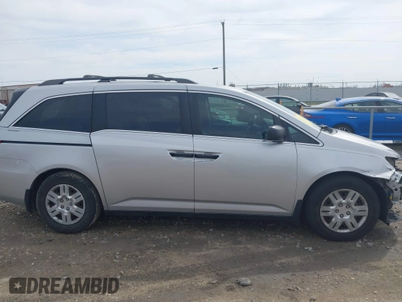 2013 Honda Odyssey LX with VIN 5FNRL5H22DB086503, listed as a IAAI auction lot 42133471 with 223,200 mi miles and . Bid and sale history available at carsss.com. Image 14.