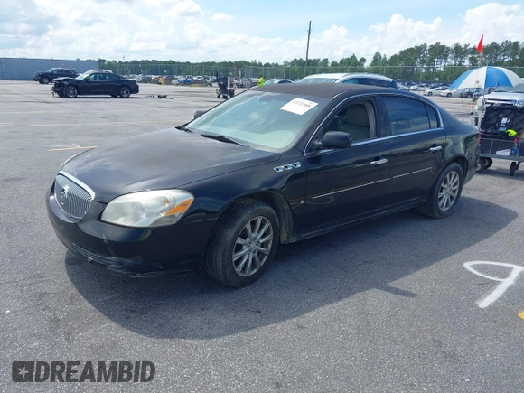 2009 Buick Lucerne CXL with VIN 1G4HD57MX9U127160, listed as a IAAI auction lot 42222588 with 219,611 mi miles and . Bid and sale history available at DreamBid. Image 2.
