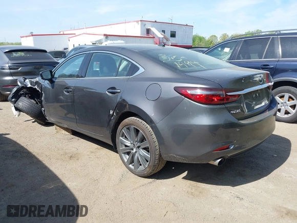 2021 Mazda 6 Grand Touring with VIN JM1GL1TY4M1600534, listed as a IAAI auction lot 42012560 with Not Provided miles. Bid and sale history available at carsss.com. Image 3.