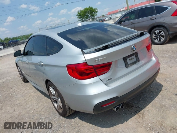 2018 BMW 3 Series 330i xDrive with VIN WBA8Z9C54JG828210, listed as a IAAI auction lot 42468521 with 72,741 mi miles and . Bid and sale history available at DreamBid. Image 3.