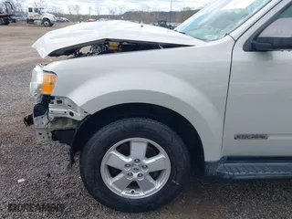 2008 Ford Escape XLT with VIN 1FMCU93ZX8KB33764, listed as a IAAI auction lot 42037456 with 195,047 mi miles. Bid and sale history available at carsss.com. Image 19.