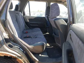 2002 Honda CR-V LX with VIN JHLRD68402C018458, listed as a IAAI auction lot 42206935 with 212,229 mi miles and . Bid and sale history available at carsss.com. Image 8.