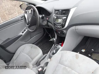 2012 Hyundai Accent SE with VIN KMHCU5AE8CU018361, listed as a IAAI auction lot 42050938 with 133,688 mi miles. Bid and sale history available at carsss.com. Image 5.