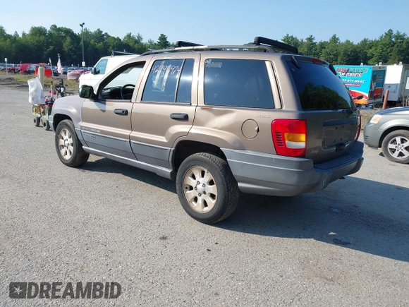 2001 Jeep Grand Cherokee Laredo with VIN 1J4GW48S31C626727, listed as a IAAI auction lot 42796974 with 132,988 mi miles and . Bid and sale history available at DreamBid. Image 3.