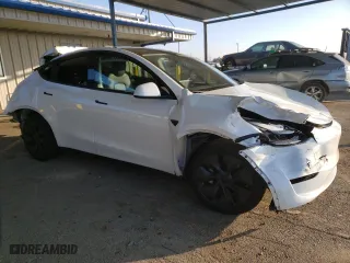 2024 Tesla Model Y Long Range with VIN 7SAYGDEE6RF190608, listed as a Copart auction lot 83378894 with 2,461 mi miles and Salvage Title. Bid and sale history available at carsss.com. Image 4.