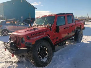 2020 Jeep Gladiator Rubicon with VIN 1C6JJTBG0LL138631, listed as a Copart auction lot 46883035 with 58,067 mi miles and Salvage Title. Bid and sale history available at DreamBid. Image 1.