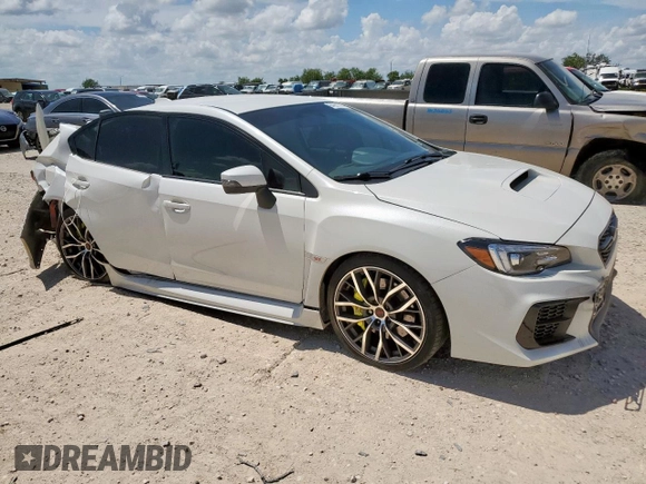 2020 Subaru WRX STI with VIN JF1VA2S69L9812385, listed as a Copart auction lot 64261335 with 17,997 mi miles and Salvage title. Bid and sale history available at DreamBid. Image 4.