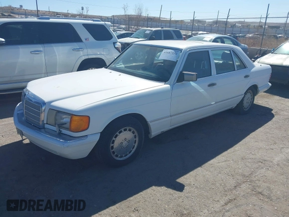 1989 Mercedes-Benz 560 with VIN WDBCA39DXKA433631, listed as a IAAI auction lot 41687132 with 137,621 mi miles and . Bid and sale history available at DreamBid. Image 2.