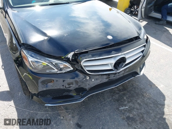 2014 Mercedes-Benz E 350 Sport with VIN WDDHF5KBXEA889555, listed as a IAAI auction lot 41589052 with 148,422 mi miles and . Bid and sale history available at DreamBid. Image 6.