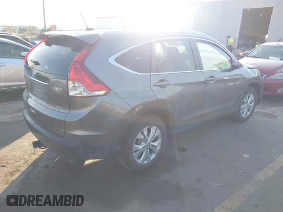 2013 Honda CR-V EX-L z VIN 5J6RM4H70DL020641, wystawiony jako IAAI lot #41361293 z przebiegiem 115 892 mil mil oraz . Historia ofert i sprzedaży dostępna na DreamBid. Obrazek 4.