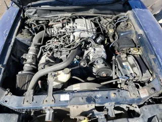 1997 Ford Mustang with VIN 1FALP404XVF156625, listed as a Copart auction lot 43497705 with 194,551 mi miles and Salvage Title. Bid and sale history available at carsss.com. Image 11.