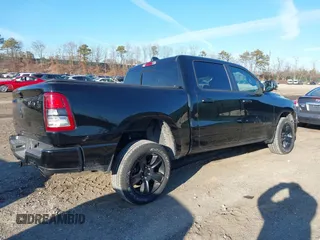 2023 Ram 1500 Big Horn with VIN 1C6SRFFT1PN660751, listed as a IAAI auction lot 41692496 with 30,215 mi miles and . Bid and sale history available at DreamBid. Image 4.