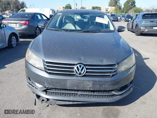 2015 Volkswagen Passat 1.8T Sport with VIN 1VWBT7A36FC020582, listed as a IAAI auction lot 41625054 with 98,613 mi miles. Bid and sale history available at carsss.com. Image 12.