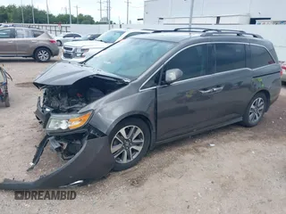 2015 Honda Odyssey Touring Elite with VIN 5FNRL5H99FB089642, listed as a IAAI auction lot 42591786 with 100,755 mi miles and . Bid and sale history available at DreamBid. Image 19.