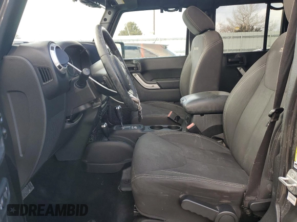 2017 Jeep Wrangler Unlimited Sahara with VIN 1C4HJWEG4HL615069, listed as a Copart auction lot 46480225 with 104,723 mi miles and Salvage title. Bid and sale history available at DreamBid. Image 7.