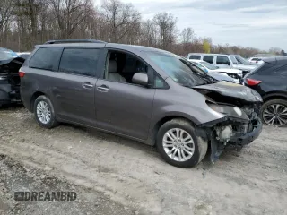 2015 Toyota Sienna XLE with VIN 5TDYK3DC4FS574285, listed as a Copart auction lot 49284185 with 0 mi miles and Salvage Title. Bid and sale history available at carsss.com. Image 4.