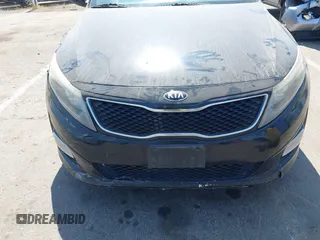 2015 Kia Optima EX z VIN 5XXGN4A75FG420329, wystawiony jako IAAI lot #42574401 z przebiegiem 223 816 mil mil oraz . Historia ofert i sprzedaży dostępna na DreamBid. Obrazek 6.