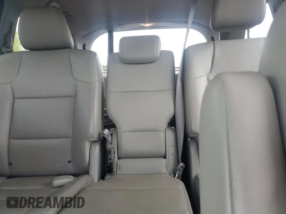 2014 Honda Odyssey EX-L with VIN 5FNRL5H63EB013483, listed as a Copart auction lot 63002435 with 127,059 mi miles and Salvage title. Bid and sale history available at DreamBid. Image 10.