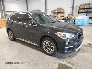 2017 BMW X1 xDrive28i with VIN WBXHT3Z39H4A51967, listed as a Copart auction lot 58843125 with 108,415 mi miles and Clean title. Bid and sale history available at DreamBid. Image 4.
