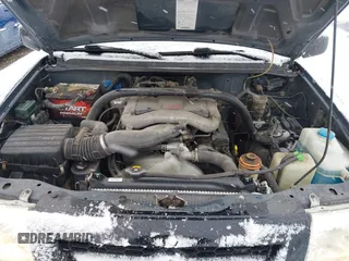 2000 Suzuki Grand Vitara JLX z VIN JS3TD62V9Y4125906, wystawiony jako IAAI lot #41202351 z przebiegiem 146 300 mil mil oraz . Historia ofert i sprzedaży dostępna na DreamBid. Obrazek 10.