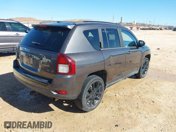 2014 Jeep Compass Sport with VIN 1C4NJCBA4ED880940, listed as a IAAI auction lot 41712357 with 156,171 mi miles. Bid and sale history available at carsss.com. Image 4.