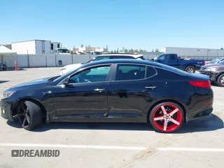 2015 Kia Optima LX z VIN 5XXGM4A76FG507580, wystawiony jako IAAI lot #42544939 z przebiegiem 99 804 mil mil oraz . Historia ofert i sprzedaży dostępna na DreamBid. Obrazek 14.