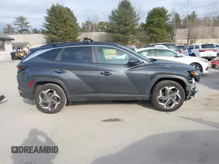 2023 Hyundai Tucson SEL with VIN 5NMJFCAE0PH281533, listed as a IAAI auction lot 41738468 with 36,881 mi miles and . Bid and sale history available at DreamBid. Image 14.
