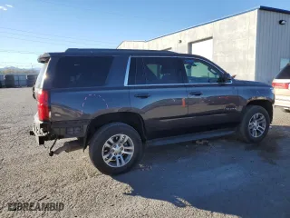 2017 Chevrolet Tahoe LS with VIN 1GNSCAKCXHR355107, listed as a Copart auction lot 87479794 with 121,880 mi miles and Salvage Title. Bid and sale history available at carsss.com. Image 3.