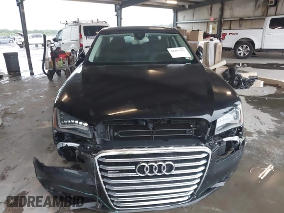 2012 Audi A8 with VIN WAUAVAFD9CN006499, listed as a IAAI auction lot 42461402 with 57,232 mi miles and . Bid and sale history available at DreamBid. Image 12.