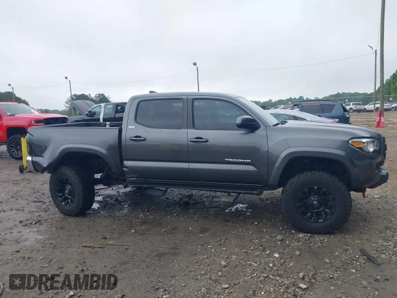 2017 Toyota Tacoma SR5 z VIN 3TMAZ5CN9HM044182, wystawiony jako IAAI lot #42116303 z przebiegiem 92 577 mil mil oraz . Historia ofert i sprzedaży dostępna na DreamBid. Obrazek 13.