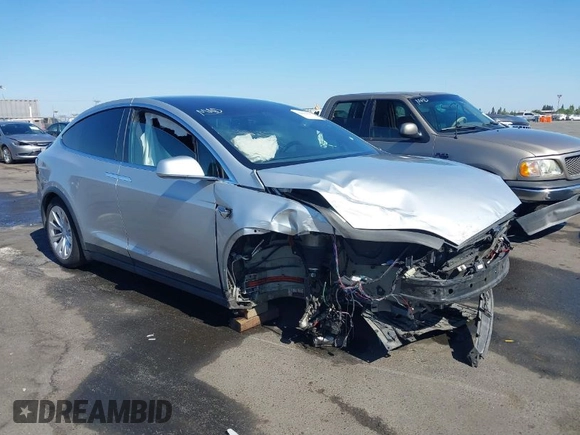 2016 Tesla Model X 70D with VIN 5YJXCAE21GF033123, listed as a IAAI auction lot 39813497 with 162,509 mi miles and . Bid and sale history available at DreamBid. Image 1.