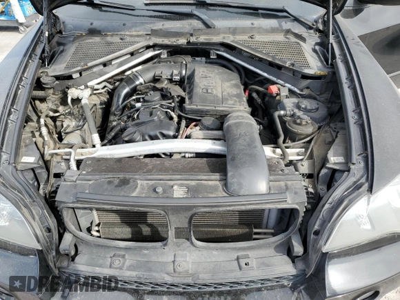 2012 BMW X5 35i z VIN 5UXZV4C51CL989449, wystawiony jako Copart lot #56762095 z przebiegiem 112 576 mil mil oraz Szkoda całkowita • Salvage title. Historia ofert i sprzedaży dostępna na DreamBid. Obrazek 12.