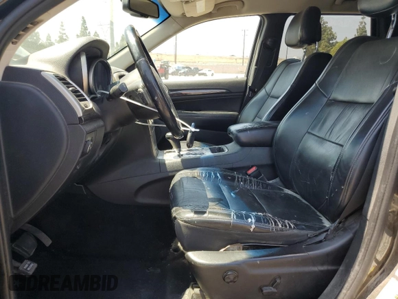 2011 Jeep Grand Cherokee Laredo with VIN 1J4RR4GG0BC563603, listed as a Copart auction lot 60237475 with 243,885 mi miles and Salvage title. Bid and sale history available at DreamBid. Image 7.
