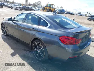2018 BMW 4 Series 440i with VIN WBA4J5C51JBF07174, listed as a IAAI auction lot 41532904 with 63,745 mi miles and . Bid and sale history available at DreamBid. Image 3.