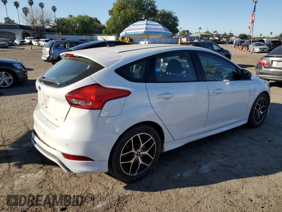 2015 Ford Focus SE with VIN 1FADP3K29FL334599, listed as a Copart auction lot 46926475 with 127,537 mi miles and Salvage Title. Bid and sale history available at DreamBid. Image 3.