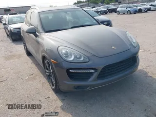 2012 Porsche Cayenne Turbo z VIN WP1AC2A29CLA80486, wystawiony jako IAAI lot #42324263 z przebiegiem 106 588 mil mil oraz . Historia ofert i sprzedaży dostępna na DreamBid. Obrazek 1.