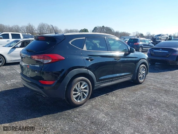 2016 Hyundai Tucson Limited with VIN KM8J33A27GU237225, listed as a IAAI auction lot 41223497 with 158,986 mi miles. Bid and sale history available at carsss.com. Image 4.
