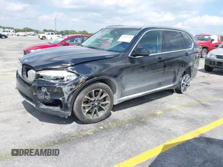2016 BMW X5 xDrive50i with VIN 5UXKR6C51G0J81658, listed as a IAAI auction lot 41801382 with 34,572 mi miles. Bid and sale history available at carsss.com. Image 19.